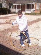 Stephanie learned how to play "hoops" at Historic Williamsburg.
